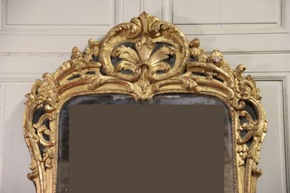 null Work of the 18th century from the South of France. Mirror with a rich carved...