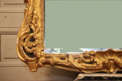 null Work of the 18th century from the South of France. Mirror with a rich carved...