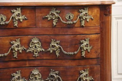 null Moulded and inlaid wood chest of drawers with geometrical decorations, walnut...