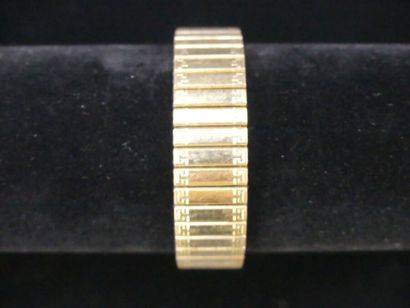 null YEMA. Montre bracelet fixo flex en métal doré, boitier quadrangulaire date à...