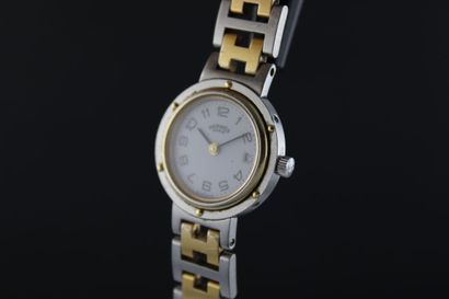 null Hermes Clipper.
Lady's wrist watch two tones. Round case with porthole type...