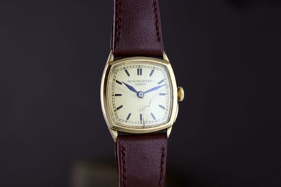 null PATEK PHILIPPE & Cie
Montre bracelet de dame en or jaune 18k. Boitier coussin....