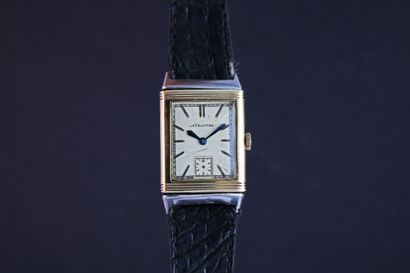 null LECOULTRE Reverso of the 1930s.
Bracelet watch in gold (14k) and steel. 
White...