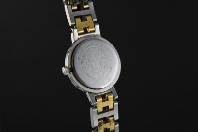 null Hermes Clipper.
Lady's wrist watch two tones. Round case with porthole type...