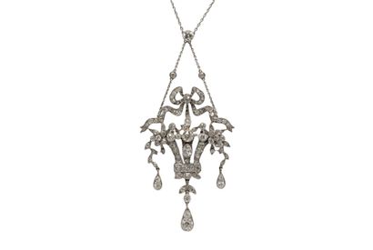 null Set in white gold750/°° composed of a diamond brooch and a chain allowing its...