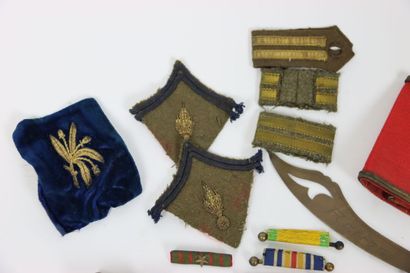 null Important lot of military insignia including: three furs. An armband. Seventeen...