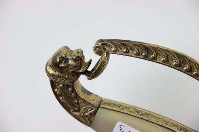 null Officer's sword. Spindle with mother-of-pearl plates. Brass mounting, chased....