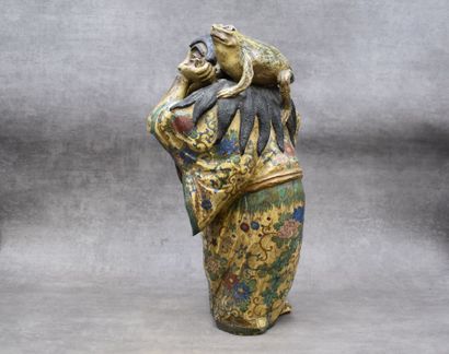 asie. Ceramic subject representing a man carrying a frog. Height : 42 cm