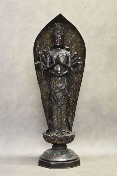 asie. Bronze deity with brown patina and cloisonné enamel standing holding a khakkara...