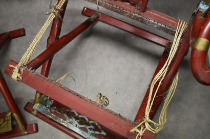 CHINE. Pair of folding armchairs in carved and red lacquered wood, openwork backs...