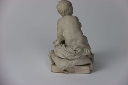 null MOUGIN, Child sitting on a cushion with flowers of lily. Sculpture in stoneware...