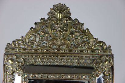 null Mirror with glazing and pediment in a frame with inverted profile decorated...