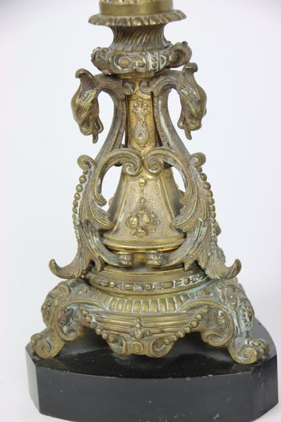 null Pair of gilt bronze candlesticks with five lights. Decorated with putti and...