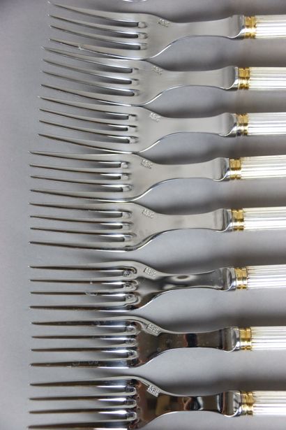 null SCOF. Combourg model. Part of a table service including. Nine knives. Nine forks....