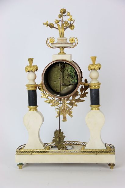 null Portico clock XVIIIth century, in white and black marble, gilded and chased...