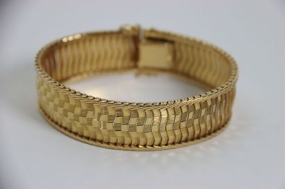 Bracelet Bracelet souple en or jaune 18K (750/1000) 

Fermoir à cliquer et double...