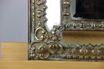 null Mirror with glazing and pediment in a frame with inverted profile decorated...