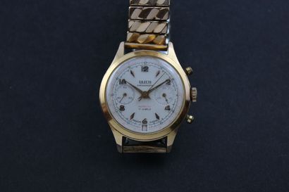 DILECTA Gold plated chronograph bracelet. Round case. Screwed back.

White dial....