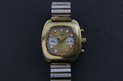 LOV Gold-plated chronograph watch. Oval case. Screwed back.

Gold dial with two white...
