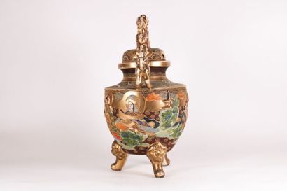 JAPON JAPAN. Polychrome earthenware set including a pair of vases and a covered pot...