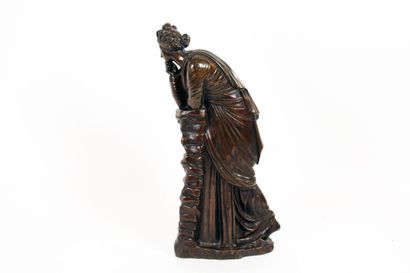 Polymnie "Polymnia" Muse of eloquence and pantomime leaning on a rock.

Bronze group...