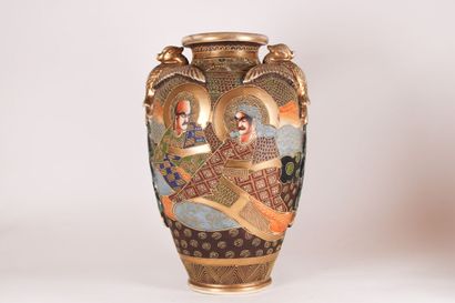 JAPON JAPAN. Polychrome earthenware set including a pair of vases and a covered pot...