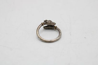 null ARTHUS BERTRAND
Silver ring (900/1000) featuring two dog heads facing each other,...