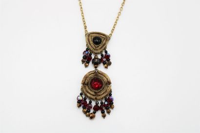 null Henry PERICHON (1910-1977)
Necklace in gilded metal centered of a triangular...