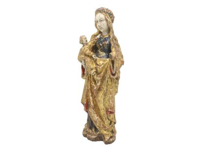 null Vierge à l'Enfant, dite "poupée de Malines" en noyer sculpté en applique, peint...