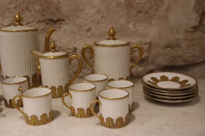 null White porcelain coffee set, decorated with gold leaves, coffee pot, sugar bowl...