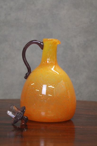 DAUM Orange blown glass jug with mauve grip and lid. Signed "Daum nancy à la croix...