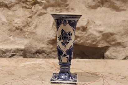 null Meeting of a covered pot and a vase in blue enamelled earthenware decorated...