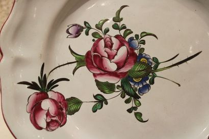 null APREY, end of the 18th century. Enameled earthenware dish with floral decoration....