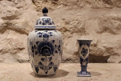 null Meeting of a covered pot and a vase in blue enamelled earthenware decorated...