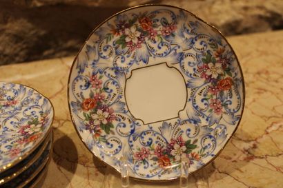 null Porcelain of LIMOGES. Part of porcelain dessert service with flowers in relief,...