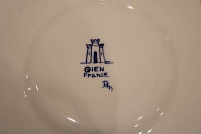 null GIEN. A dessert service with flowers decoration, signed SM ?, including 12 small...
