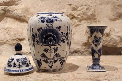 null Meeting of a covered pot and a vase in blue enamelled earthenware decorated...
