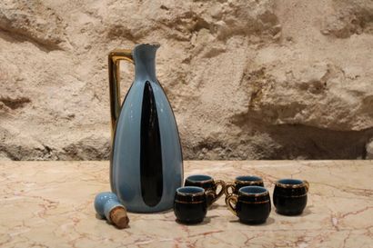 null A liqueur service Terre d'acier Revol Saint-Use in blue striped ceramic, including...