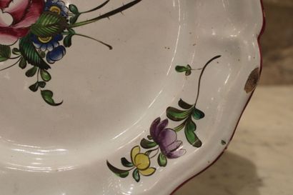 null APREY, end of the 18th century. Enameled earthenware dish with floral decoration....