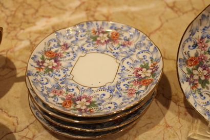 null Porcelain of LIMOGES. Part of porcelain dessert service with flowers in relief,...