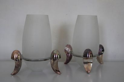 null Pair of opaline candle holders, resting on a silver plated base marked 'Fink',...