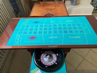 null Wooden game table, resting on four hexagonal legs joined by a spacer, c. 1950....