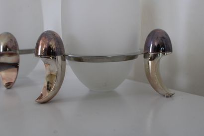 null Pair of opaline candle holders, resting on a silver plated base marked 'Fink',...