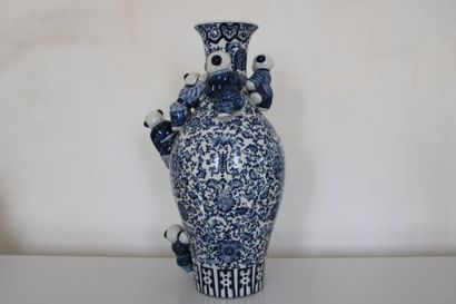 null CHINA, Porcelain vase, decorated with characters in blue monochrome, 20th century....