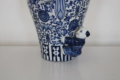 null CHINA, Porcelain vase, decorated with characters in blue monochrome, 20th century....