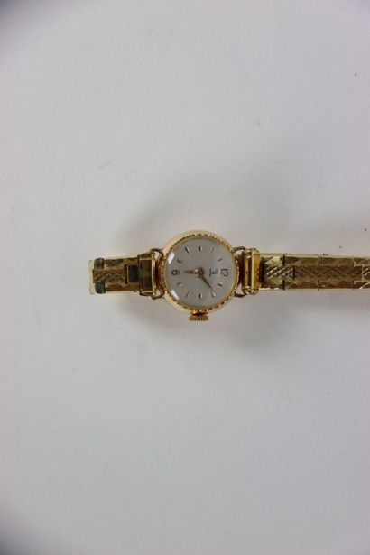 null Meeting of two watches in gilded metal. We add a piece of gilded metal of the...