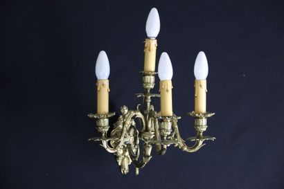 null Pair of sconces in chased and gilded bronzes with 4 lights in rocaille style....