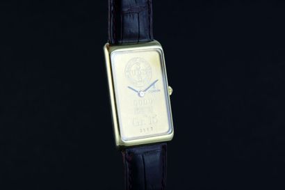CORUM UBS 15gr Lingot Montre bracelet en or jaune 18k. Boitier rectangulaire. Fond...