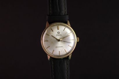 OMEGA Seamaster réf.165.002 Montre bracelet plaquée or. Boitier rond. Fond vissé...