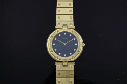 null CARTIER Santos round ref.8191
Wrist watch in 18k yellow gold. Round case with...